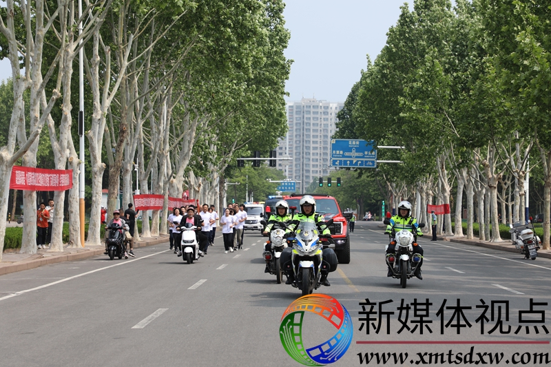 图二、2025年5月16日，护航火炬接力跑。.JPG